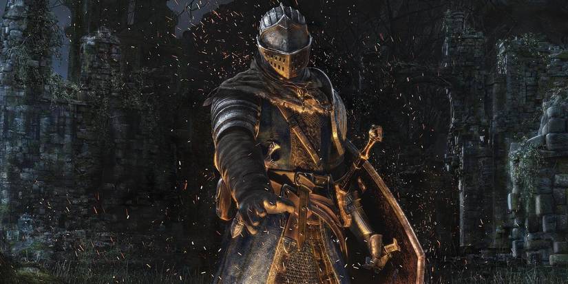 A knight under the rain aiming a sword at the camera in Dark Souls