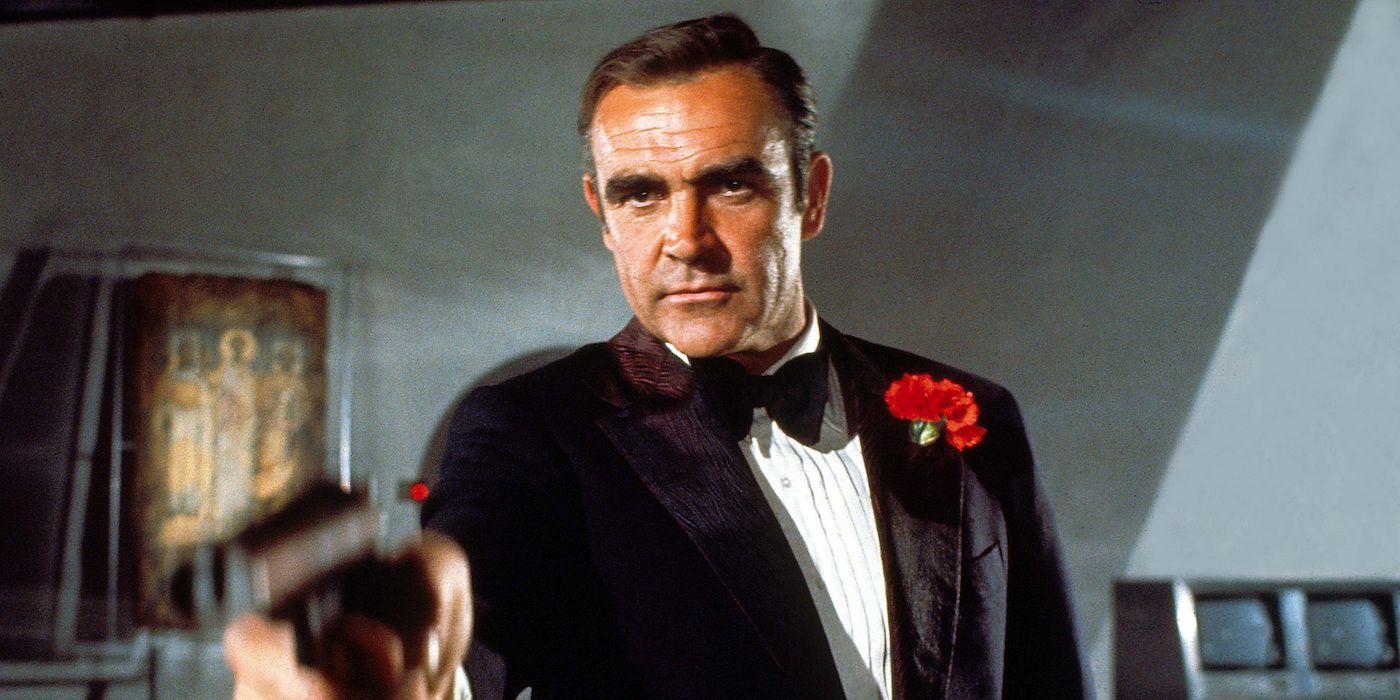 Sean Connery as James Bond wearing a tuxedo and aiming his gun off-camera in Diamonds Are Forever