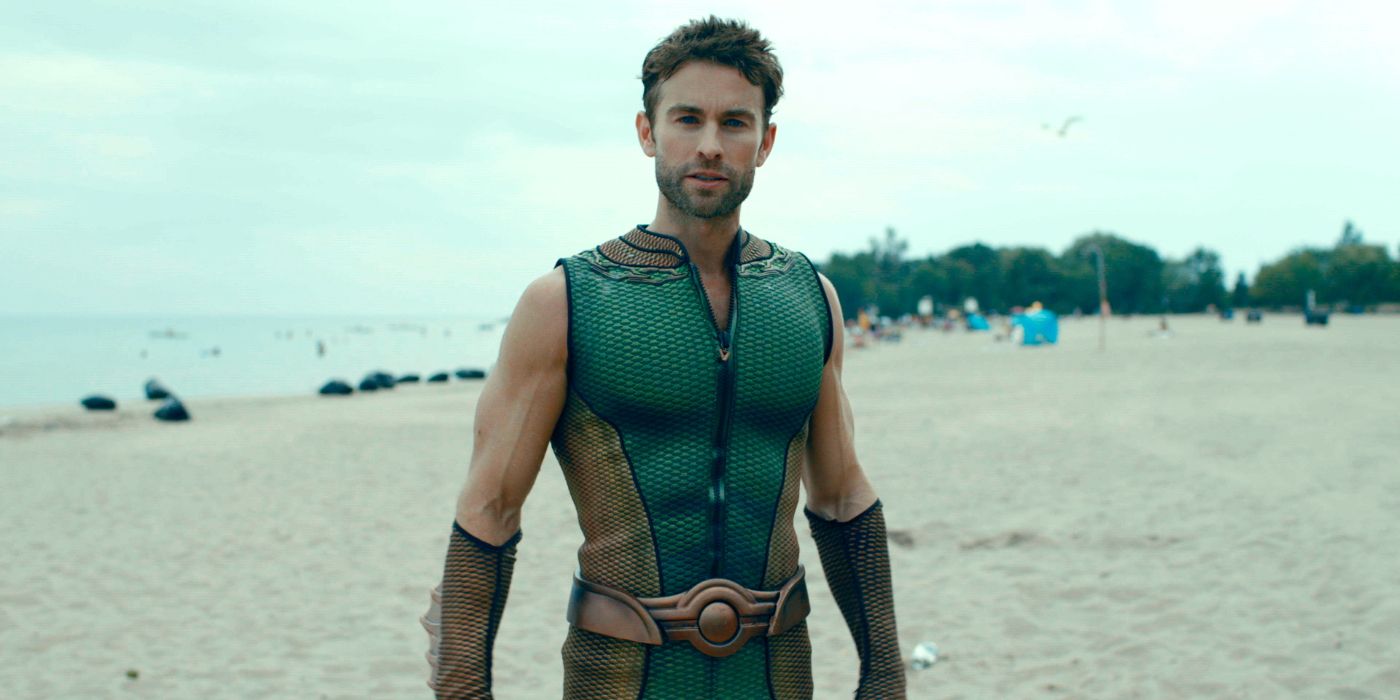 The Deep (Chace Crawford) standing on the beach during a commercial on The Boys