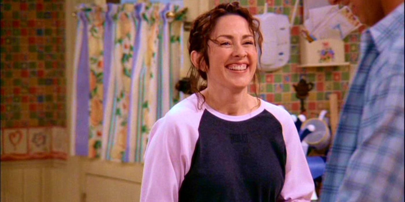 An official screenshot of Patricia Heaton as Debra Barone laughing in Everybody Loves Raymond