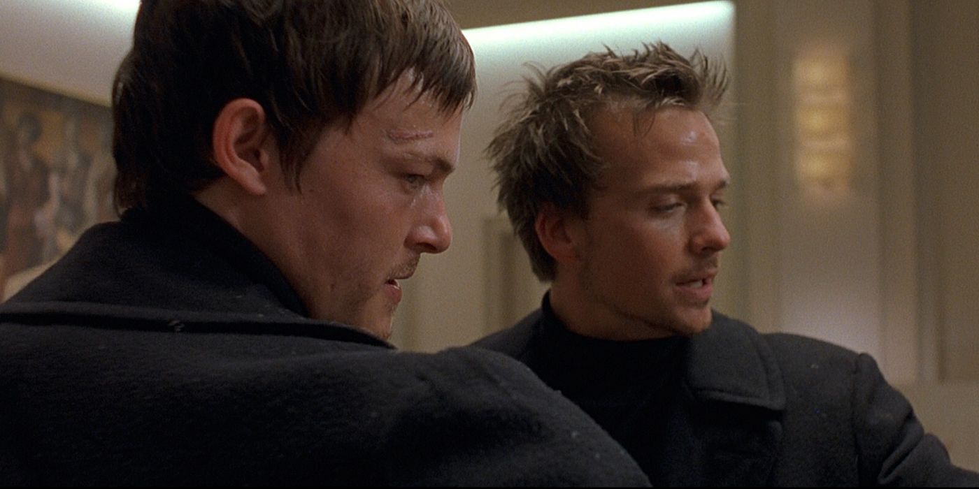 Norman Reedus and Sean Patrick Flannery as Murphy and Connor aiming their guns down in The Boondock Saints