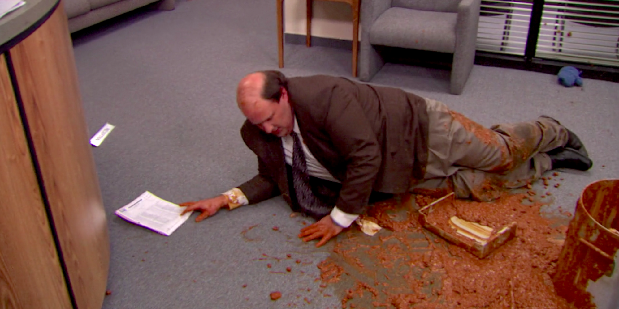 Kevin spills his pot of beans in The Office