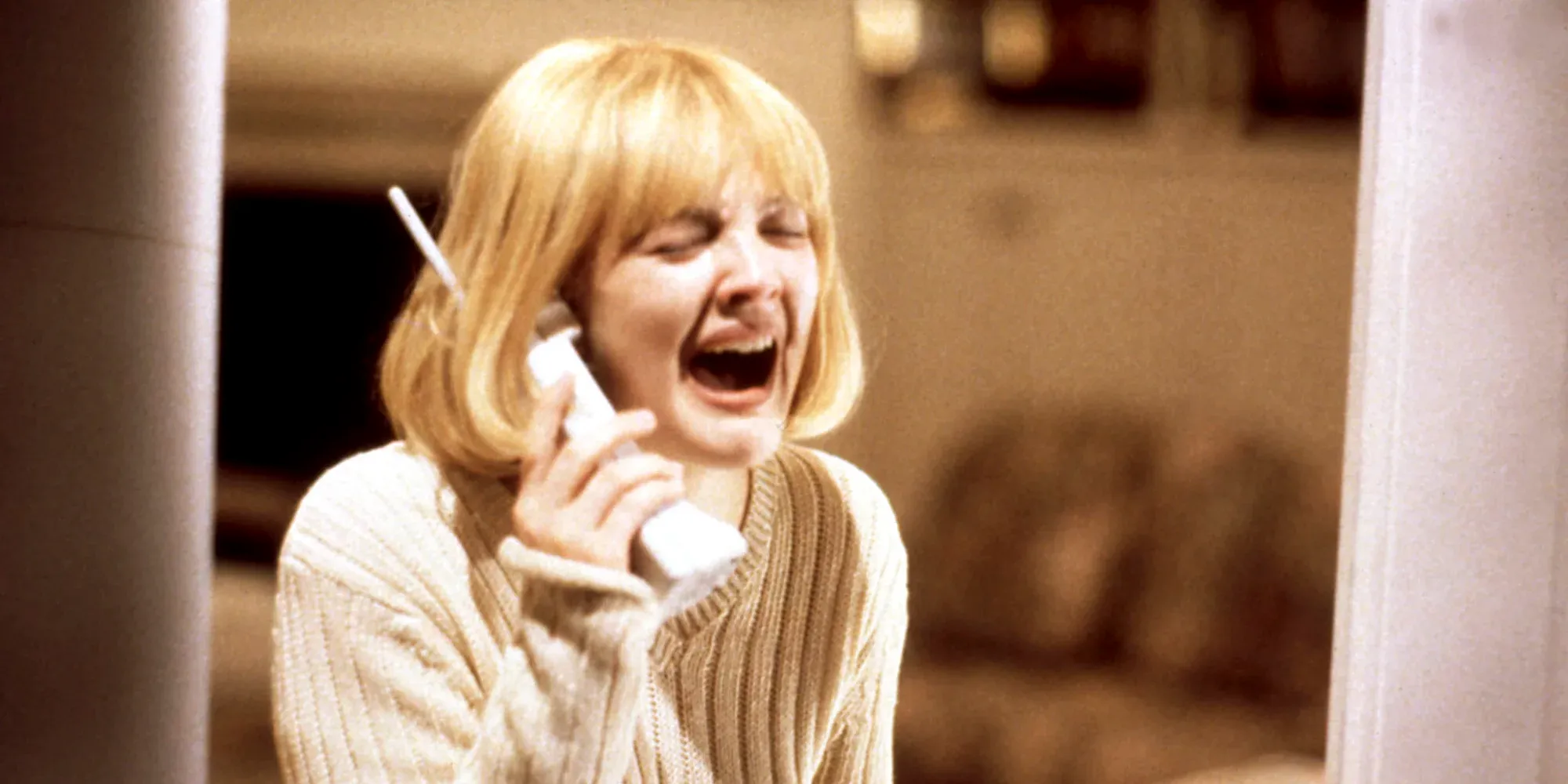 A teenager screaming on the phone