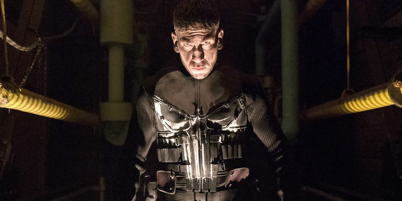 The Punisher in a dark hallway looking at the camera