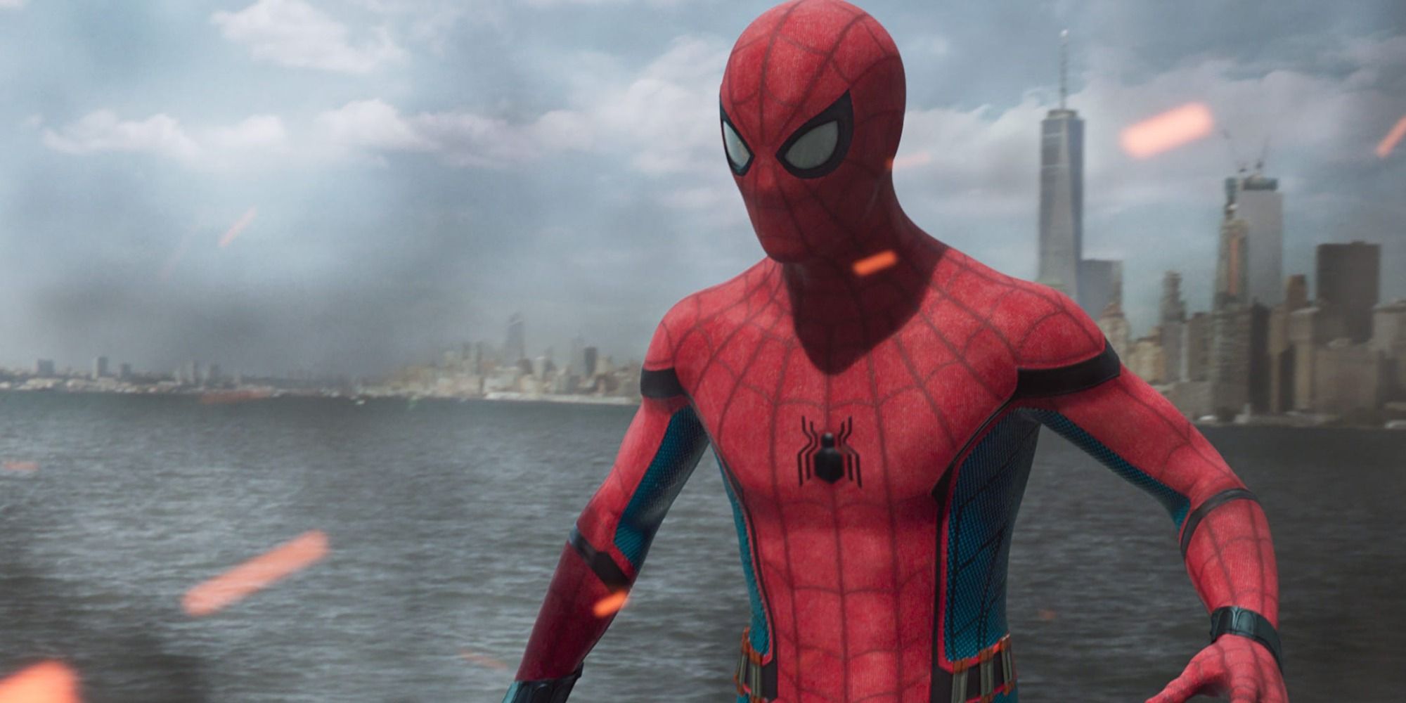 Spider-Man standing amidst smoke and embers on boat in water with New York City in background