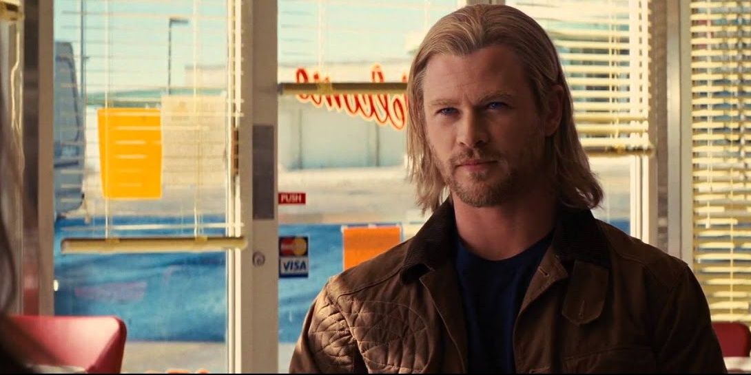 Thor from the movie Thor (2011) sitting in a diner. 