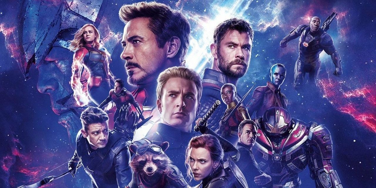 Rocket Raccoon, Iron Man, Thor, Hawkeye, Okoye, Nebula, Bruce Banner, Hulk Buster Armor, War Machine, And-Man, Captain Marvel and Captain American looking off in the distance