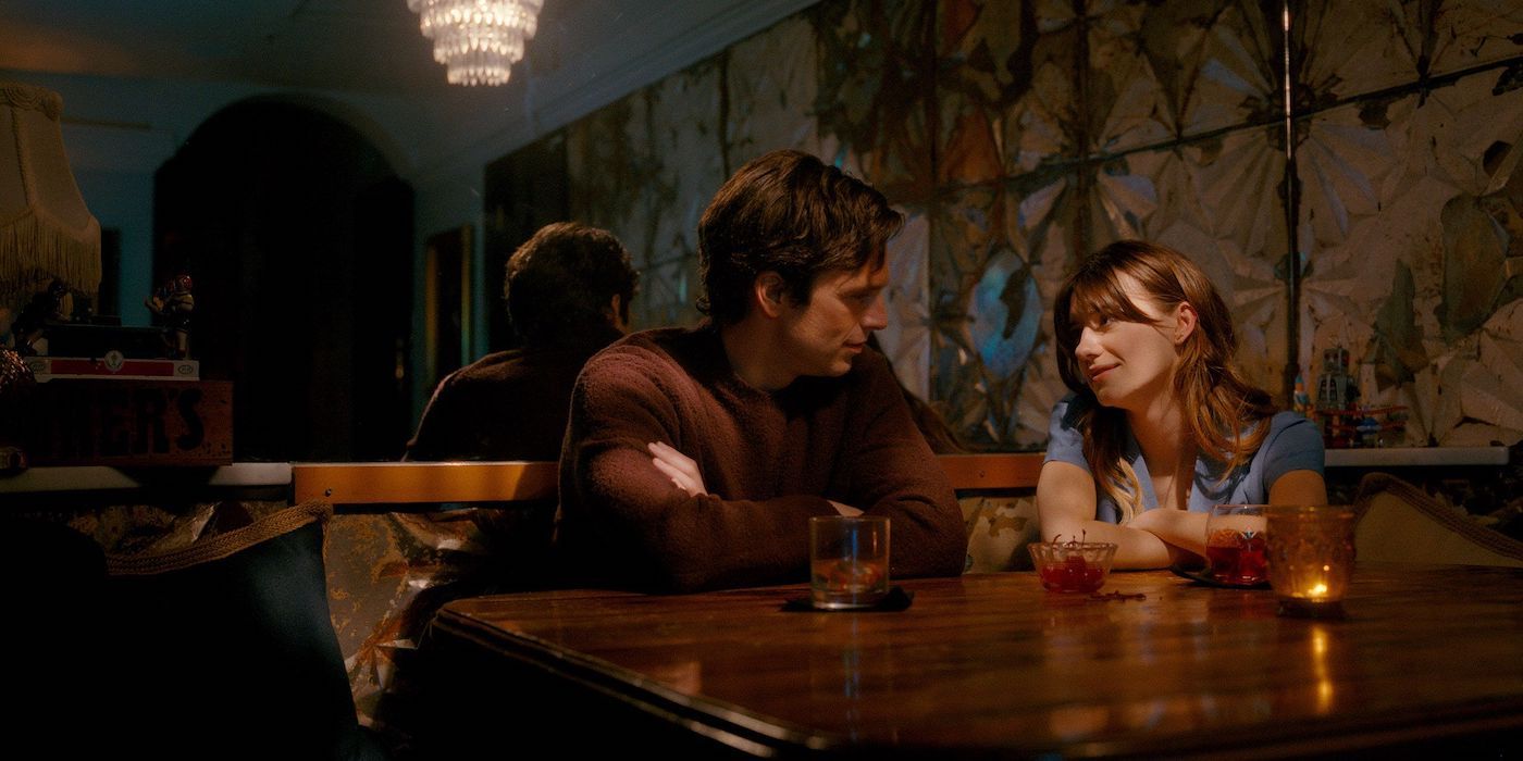 A couple sitting together in a bar