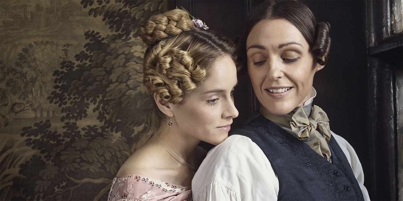 Anne Walker (Sophie Rundle) leaning her head on the shoulder of Anne Lister (Suranne Jones) in a poster for Gentleman Jack