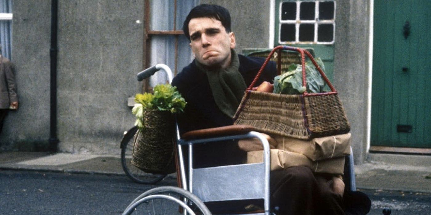 Daniel Day-Lewis as Christy Brown on his wheelchair in the street in My Left Foot.