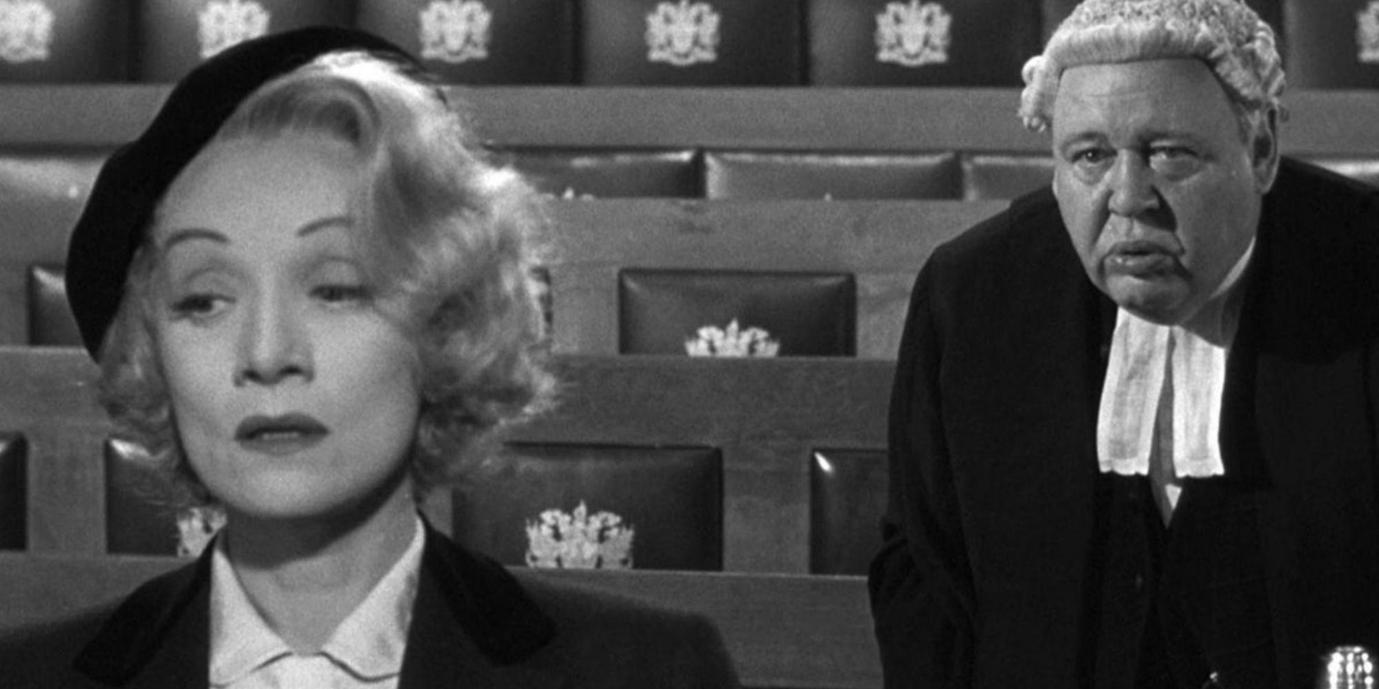 Marlene Dietrich as Christine Vole crying while a judge stands behind her in Witness for the Prosecution