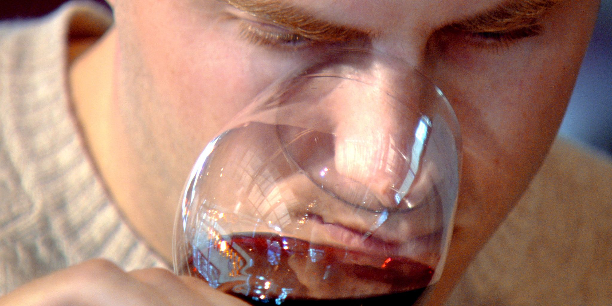 An applicant to be a Master Somm sniffs wine in the doc "Somm."