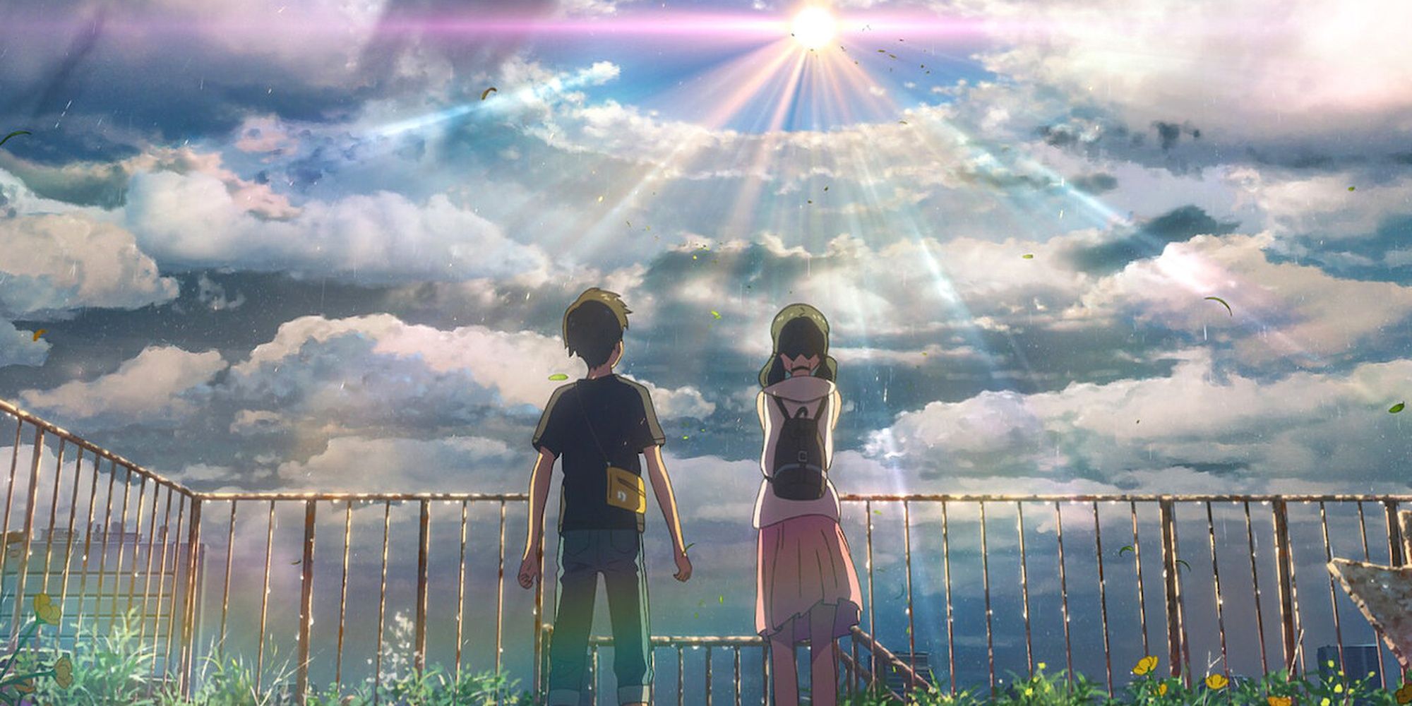 Hodaka and Hina from Weathering with You looking at a beautiful rainbow light coming out of the clouds in the sky