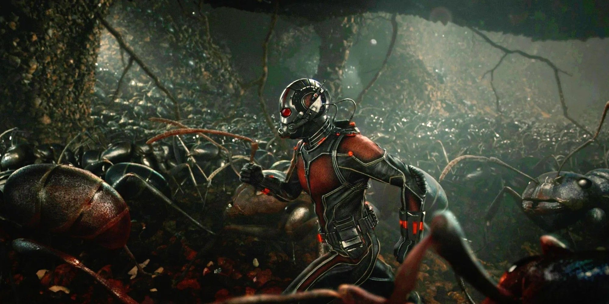 Ant-Man running underground with a group of ants