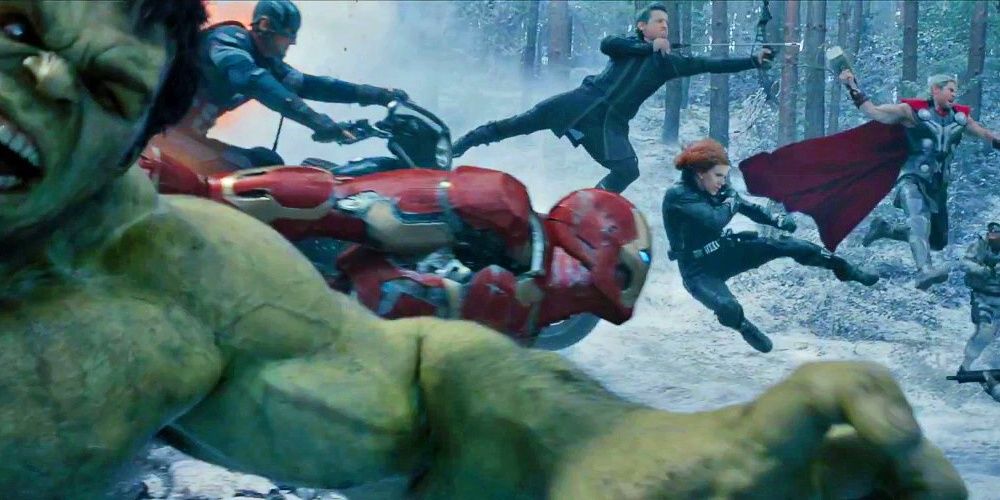 Hulk, Iron Man, Captian America, Hawkeye, Black Widow, and Thor in fighting pose mid air heading right