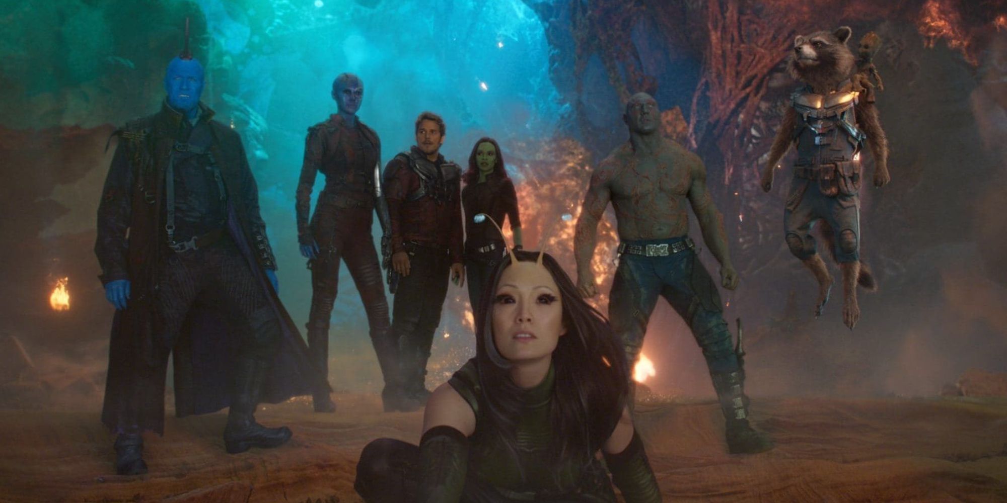 The Guardians of the Galaxy, plus Mantis and Yondu, posing in an action shot from the second film
