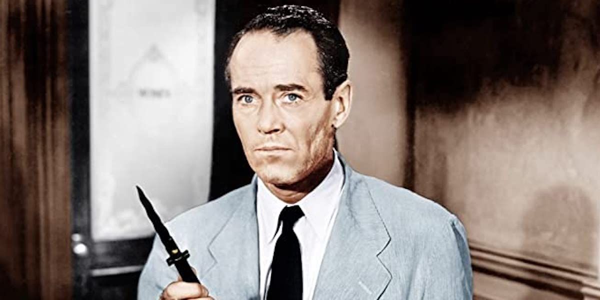 Henry Fonda as the Juror #8 holding a knife in '12 Angry Men'