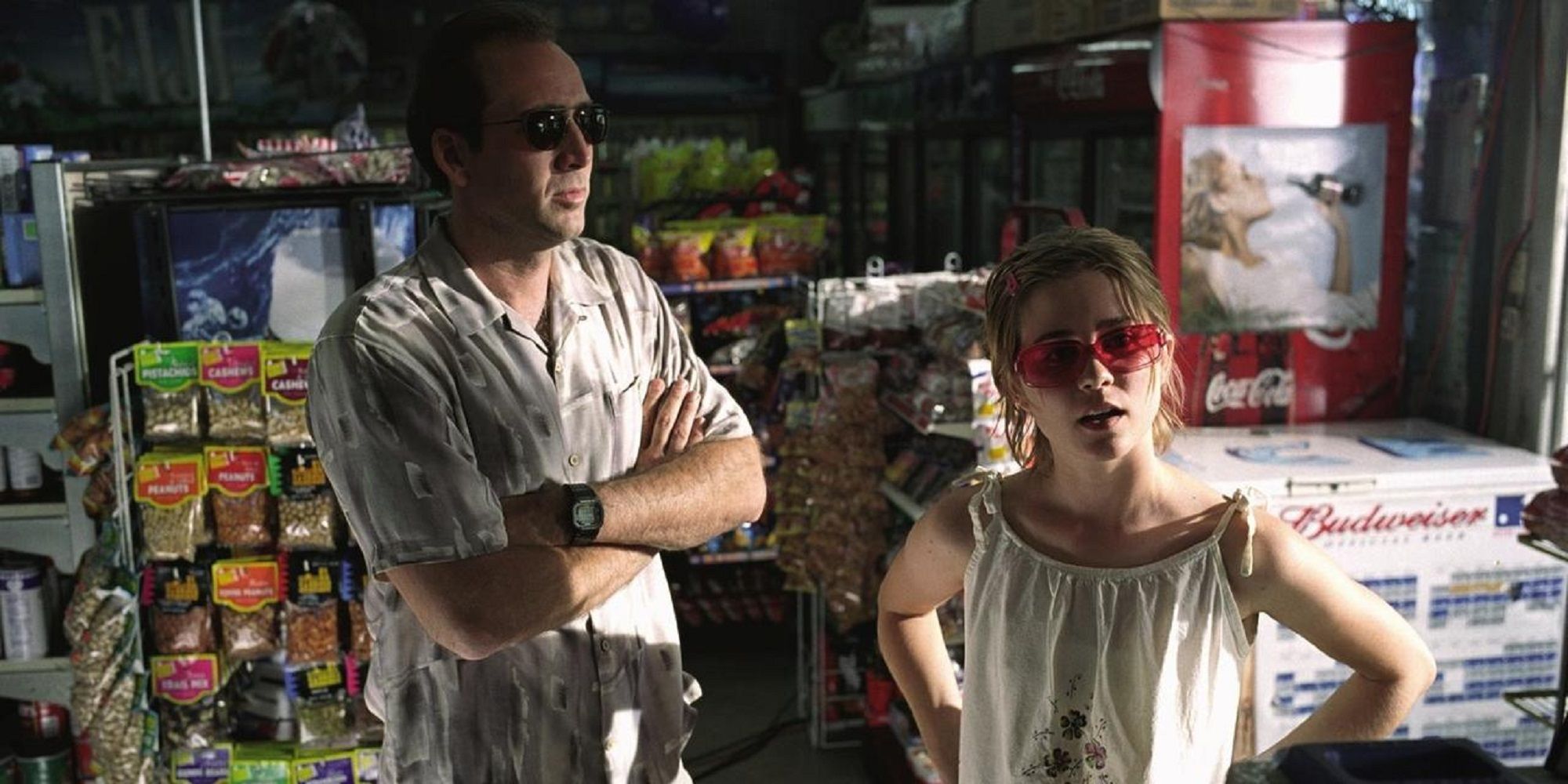 Nicolas Cage and Allison Lohman as Roy and Angela in a convenience store in Matchstick Men
