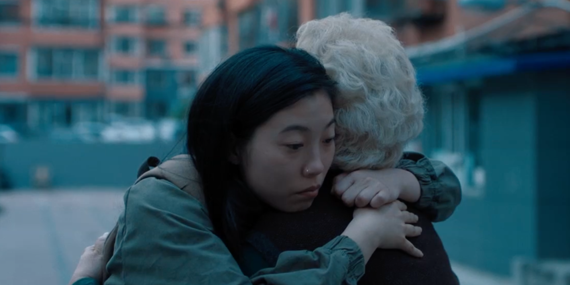 A still of Awkwafina hugging her imaginary grandmother in The Farewell Movie