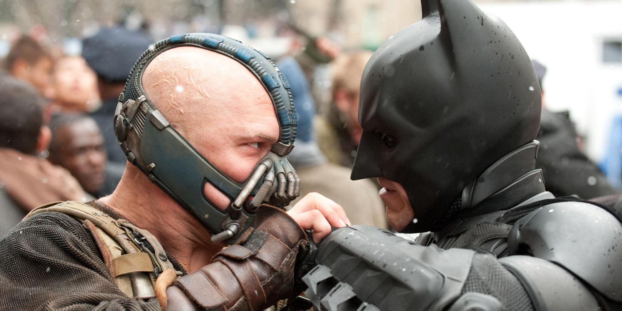 Bane (Tom Hardy) and Batman (Christian Bale) fighting in The Dark Knight Rises