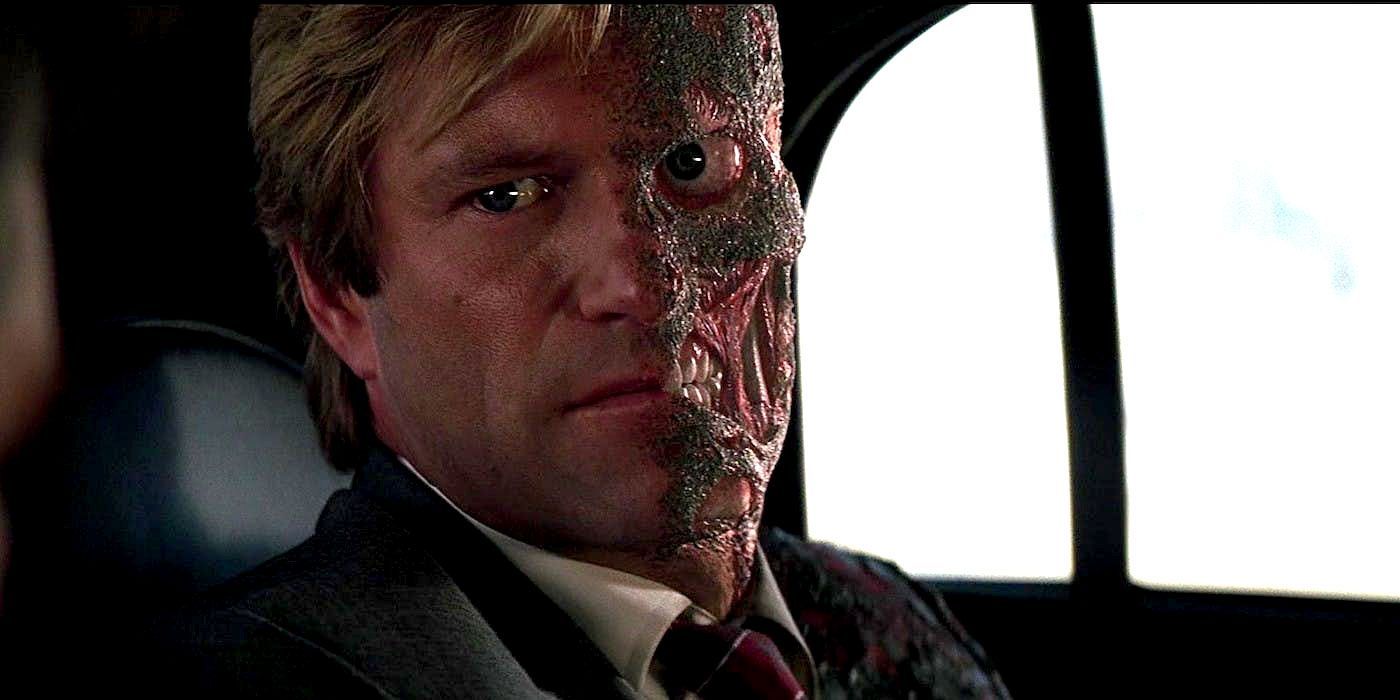 Two-Face, played by Aaron Eckhart, in the car in 'The Dark Knight'