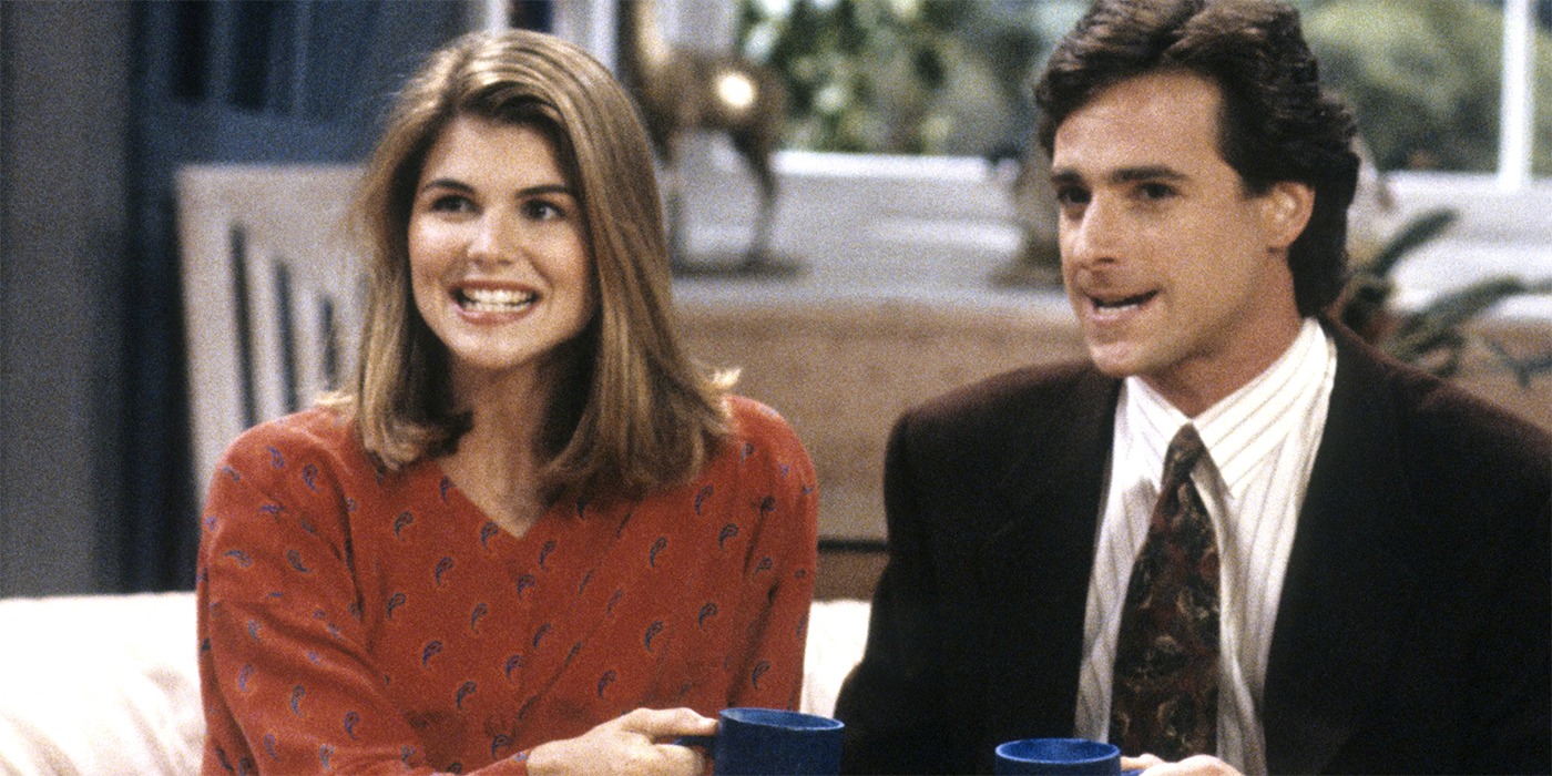 Lori Loughlin and Bob Saget using their coffee mugs to "cheers!" in 'Full House'