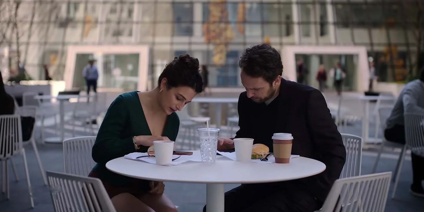 Jenny Slate and Charlie Day on their phones in I Want You Back