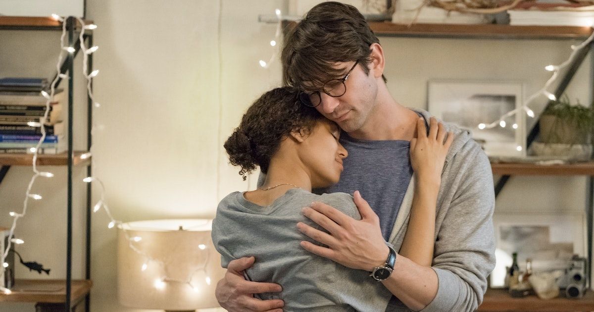 Gugu Mbatha-Raw and Michiel Huisman hugging in Irreplaceable You