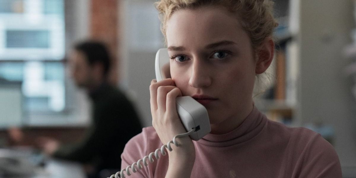 Jane, played by Julia Garner, on the phone in 'The Assistant'