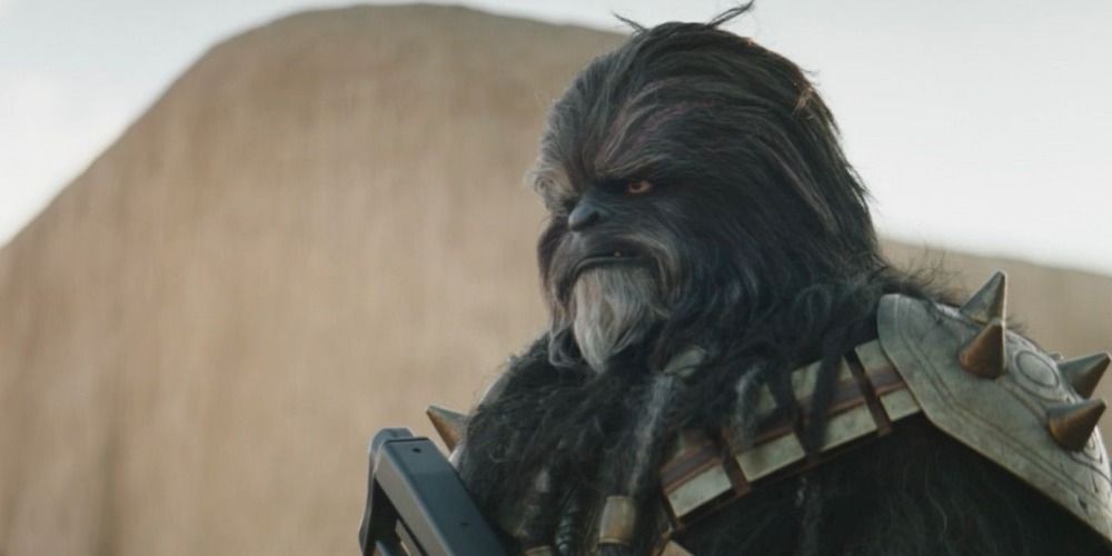 Le Wookiee Noir Krrsantan se trouve à Mos Espa