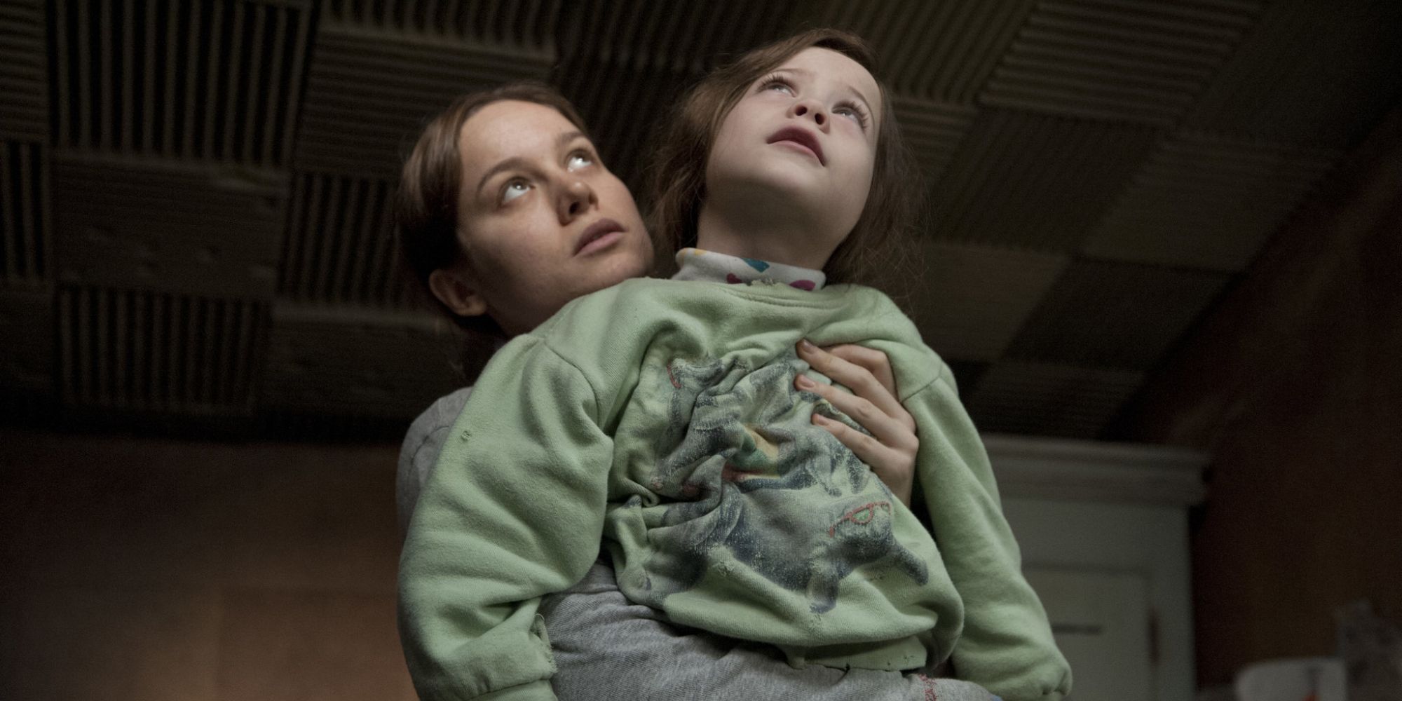 Still of Brie Larson embracing Jacob Tremblay in Room movie