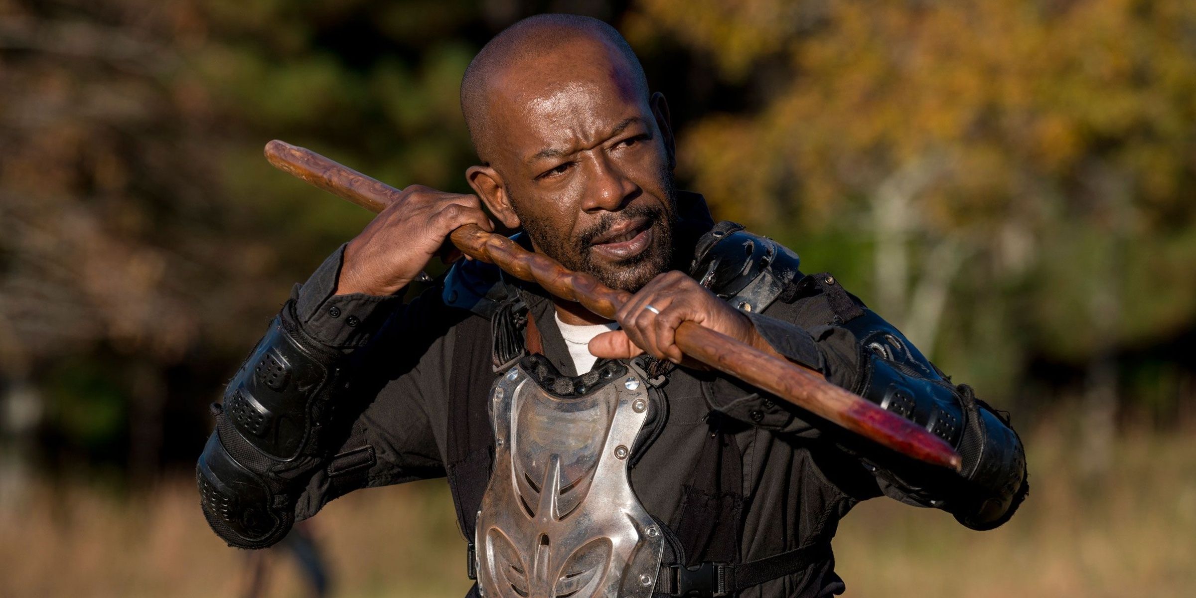 Morgan wields a bloodied, wooden spike as a weapon in 'The Walking Dead'