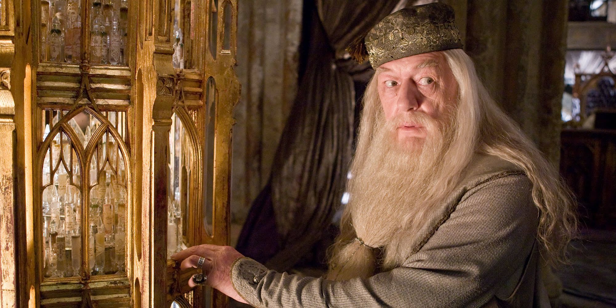 Albus Dumbledore about to take vials of his memories