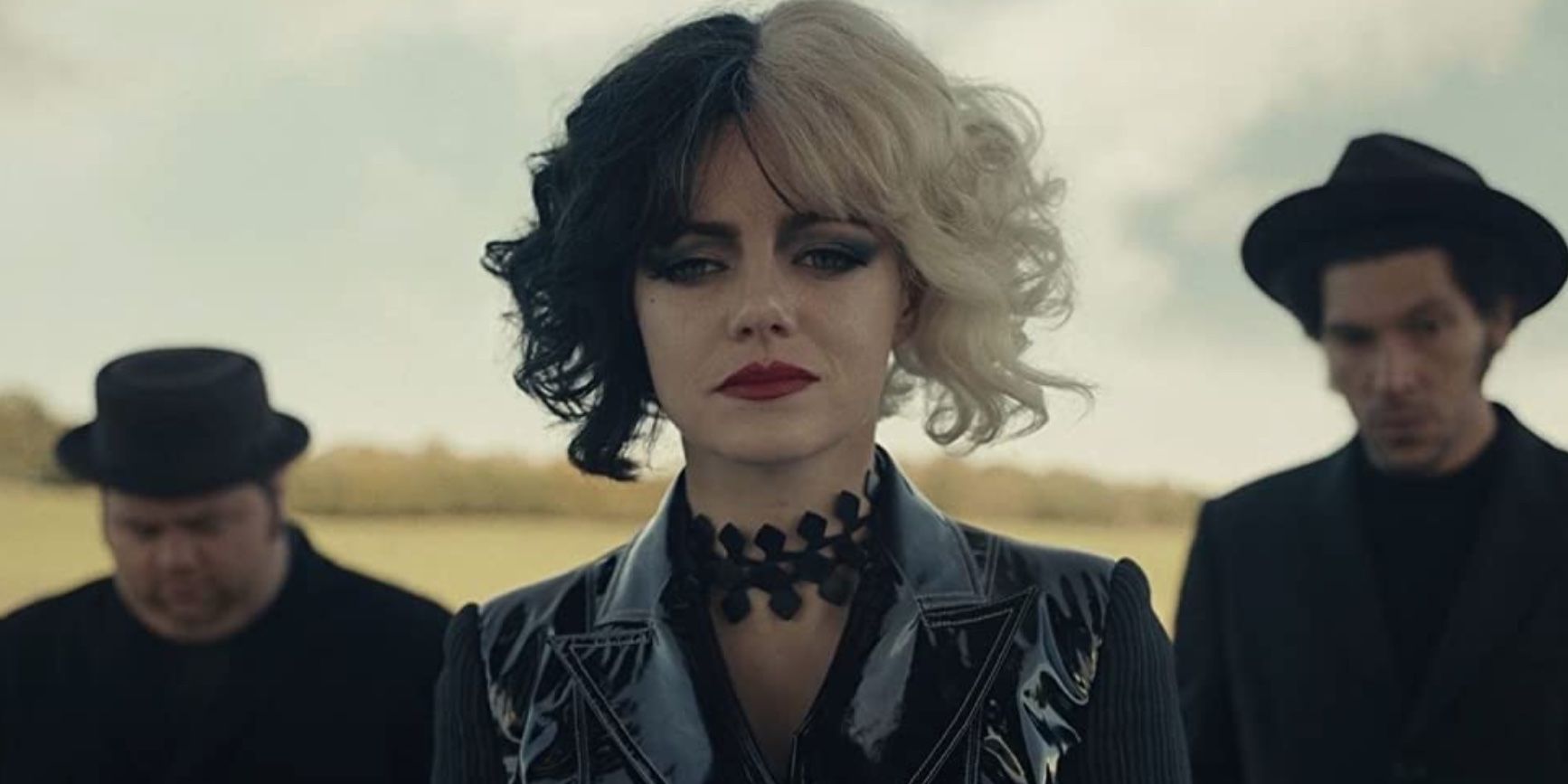 Emma Stone, Joel Fry, and Paul Walter Hauser in 'Cruella'