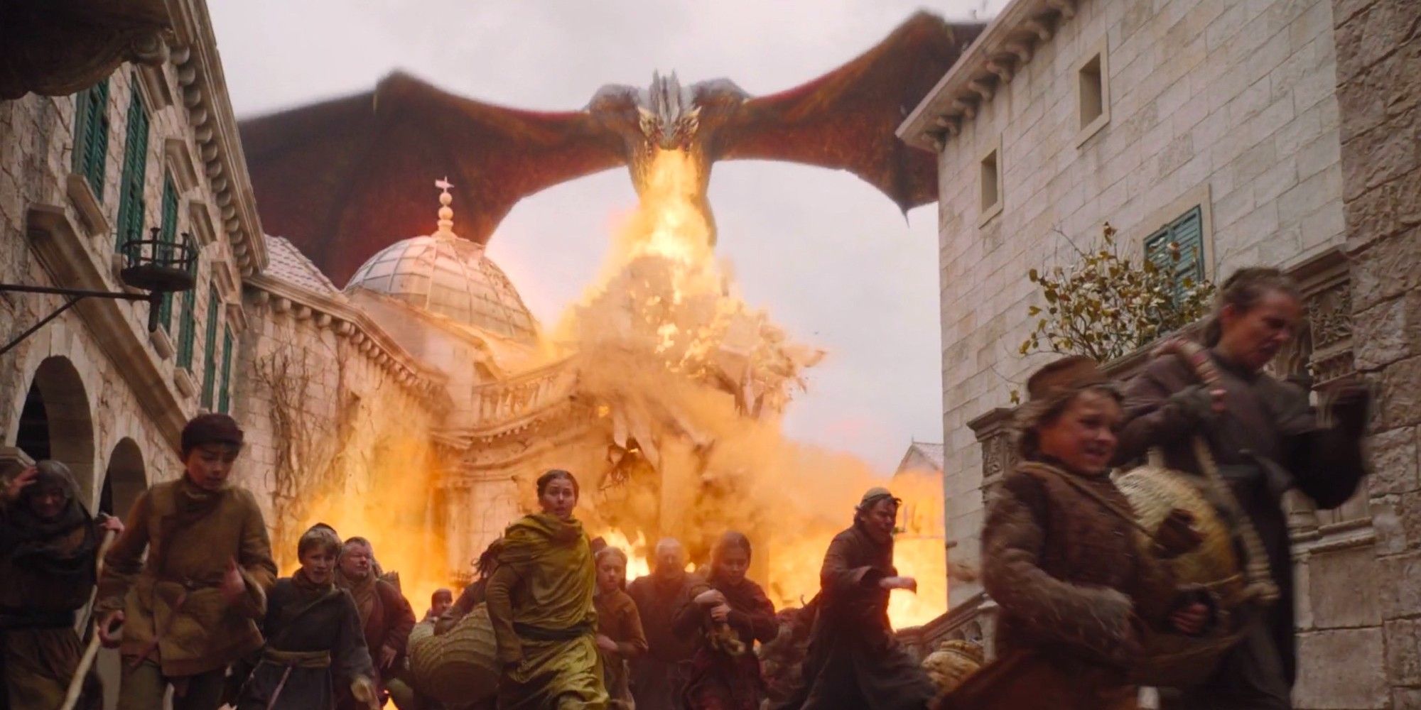 A dragon breathes fire on Kings Landing as people flee in 'Game of Thrones'