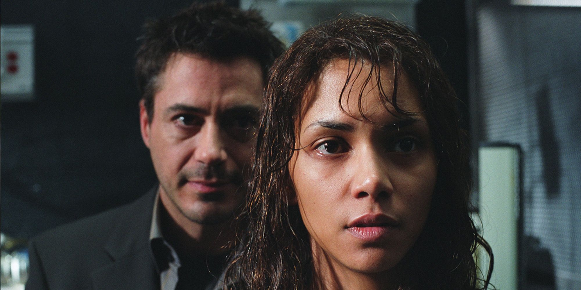 Pete standing behind Miranda in Gothika