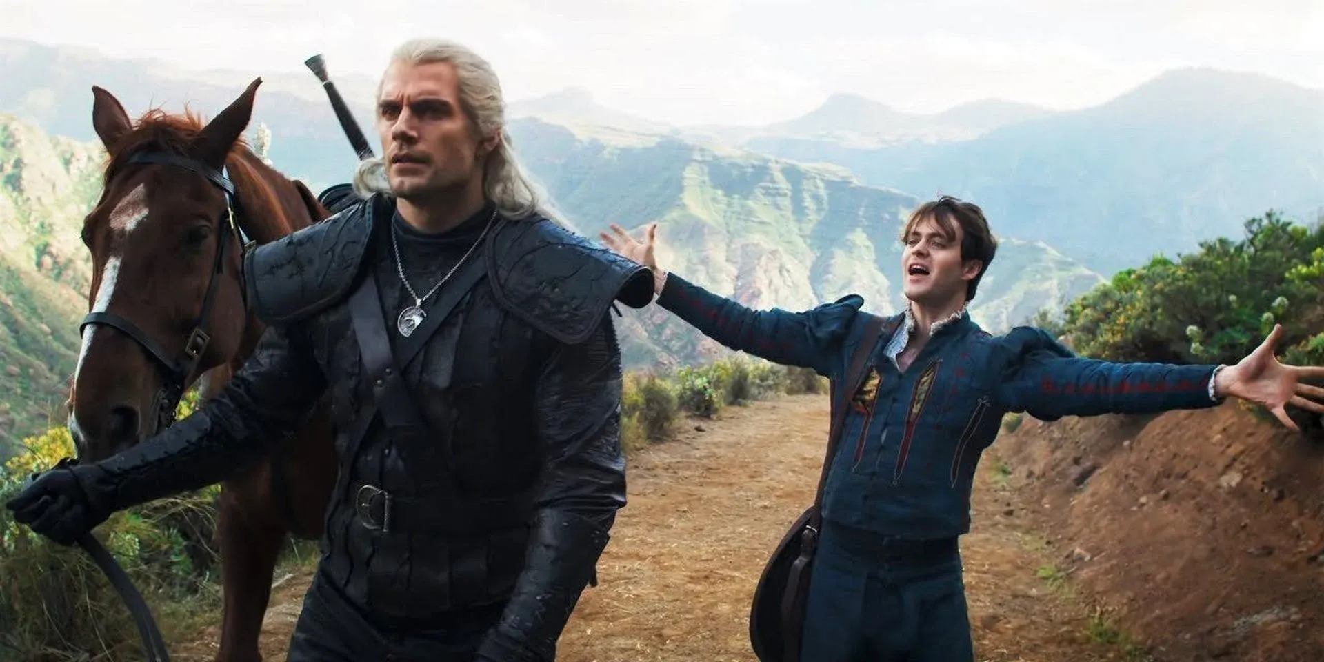 Henry Cavill as Geralt and Joey Batey as Jaskier in The Witcher