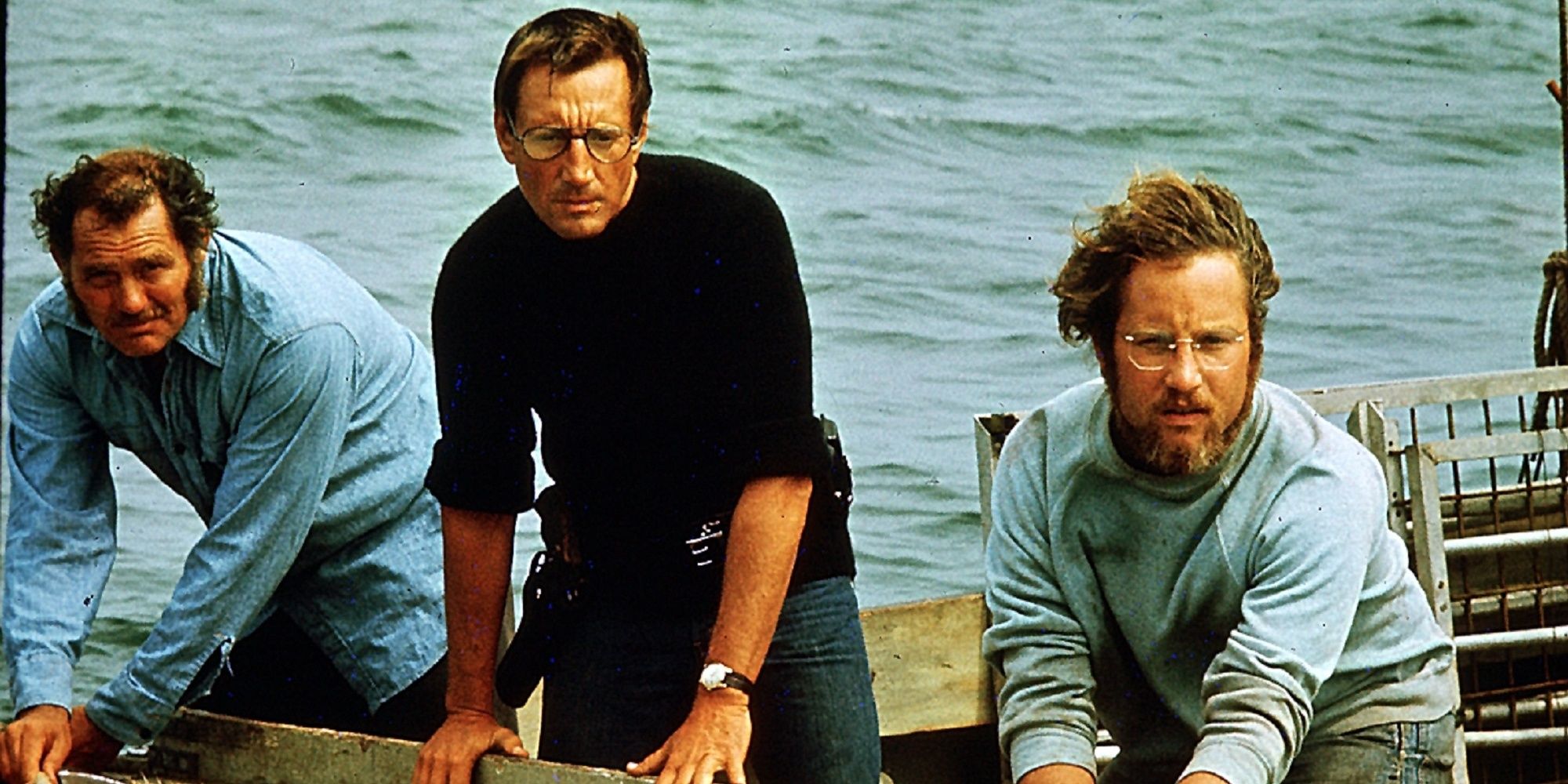 Jaws - Three men on a boat looking at the ocean water