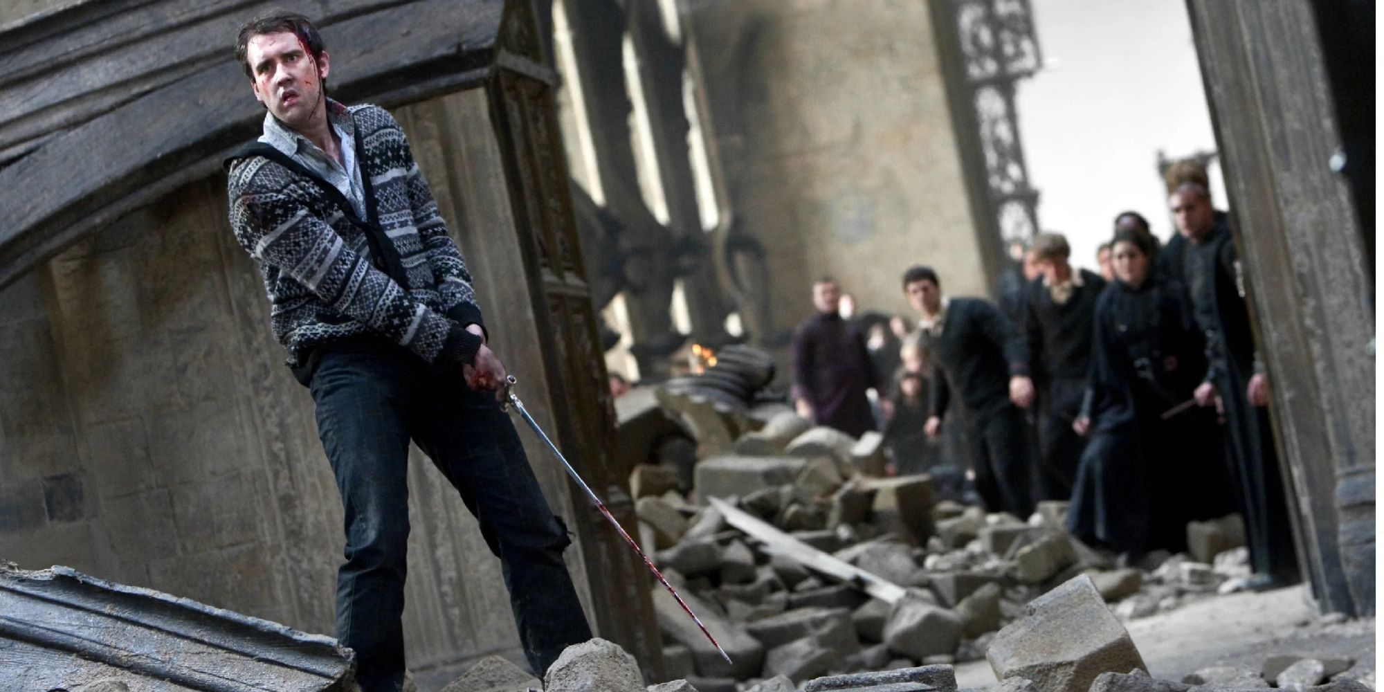Neville Longbottom, played by Matthew Lewis, holding the Sword of Gryffindor in 'Harry Potter and the Deathly Hallows: Part 2.'