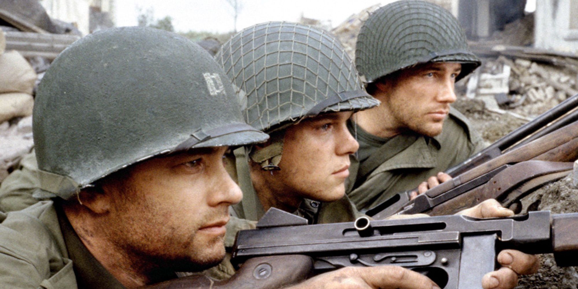 Tom Hanks as Captain Miller & Matt Damon as Private Ryan holding guns in the trenches in Saving Private Ryan