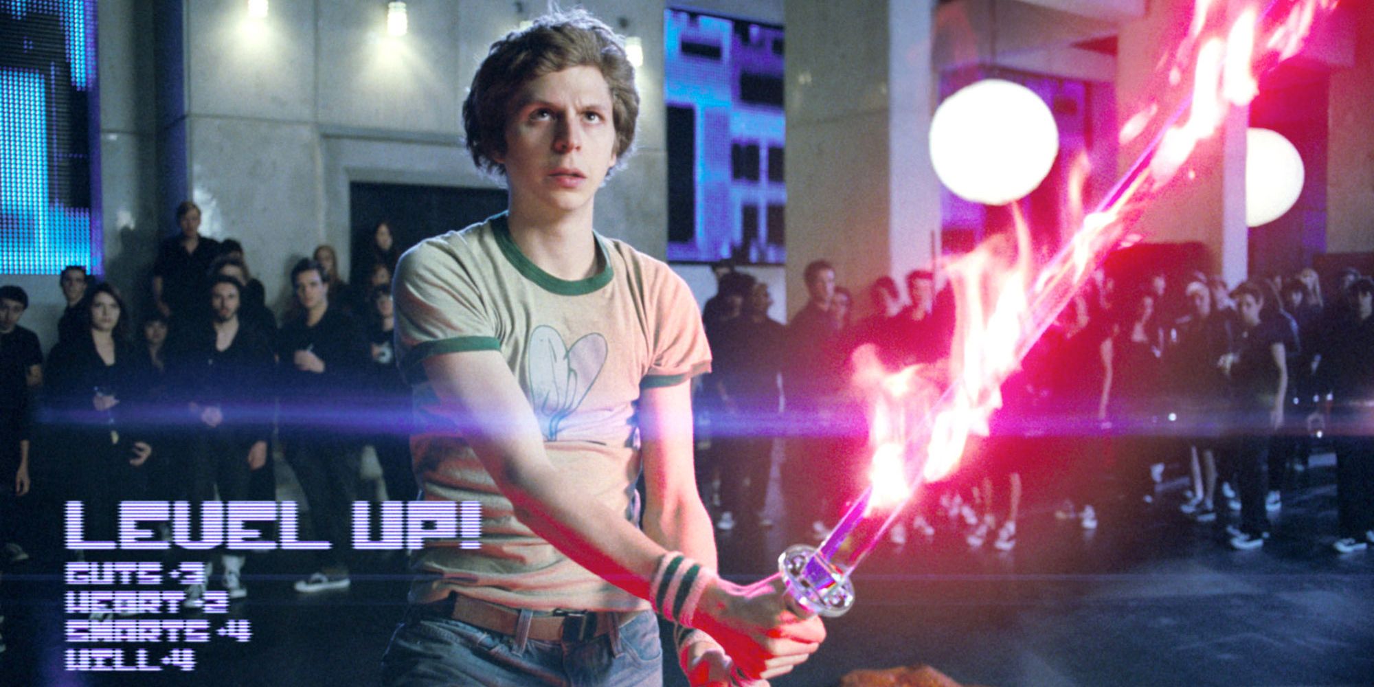 Scott Pilgrim tenant une épée rouge flamboyante dans Scott Pilgrim vs. the World.