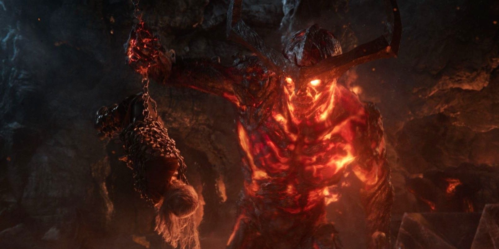 Surtur, o demônio do fogo, conversando com Thor acorrentado em Thor: Ragnarok
