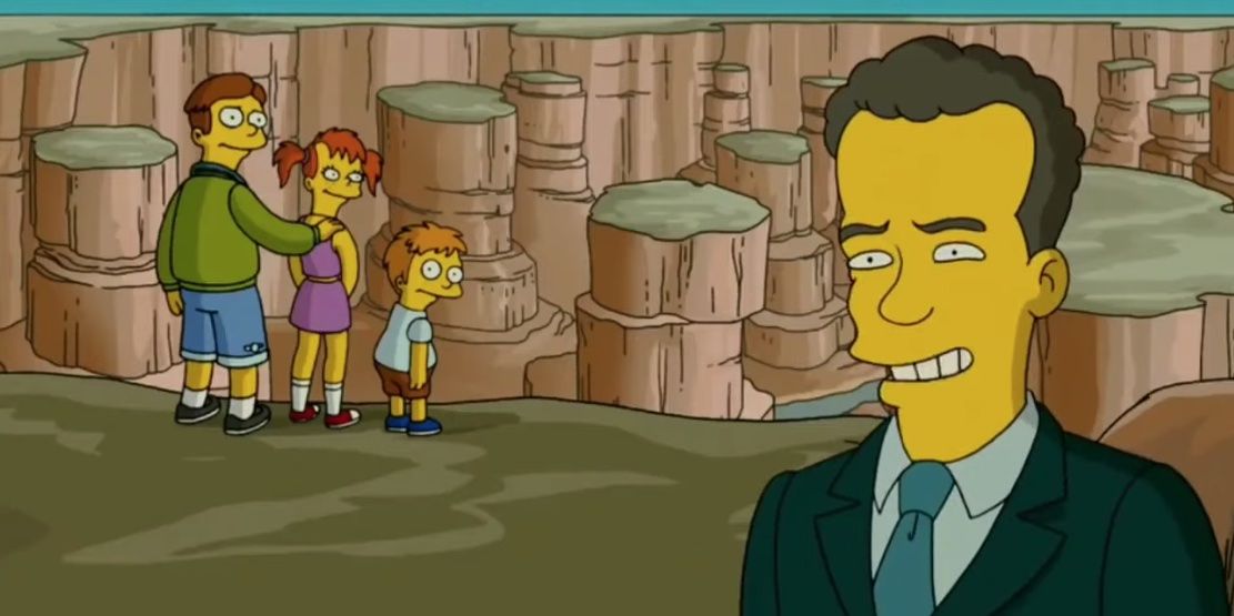 Tom Hanks dans Le film des Simpson avec un père, une fille et un garçon au-dessus du Grand Canyon en arrière-plan.