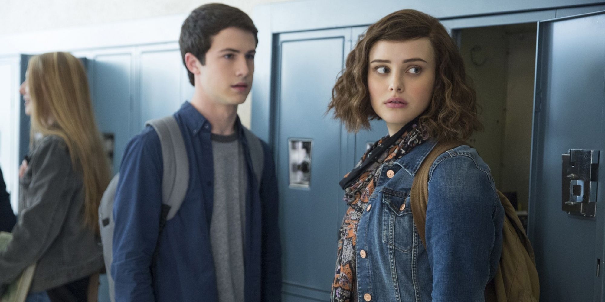 Dylan Minnette and Katherine Langford in '13 Reasons Why' standing by their lockers at school