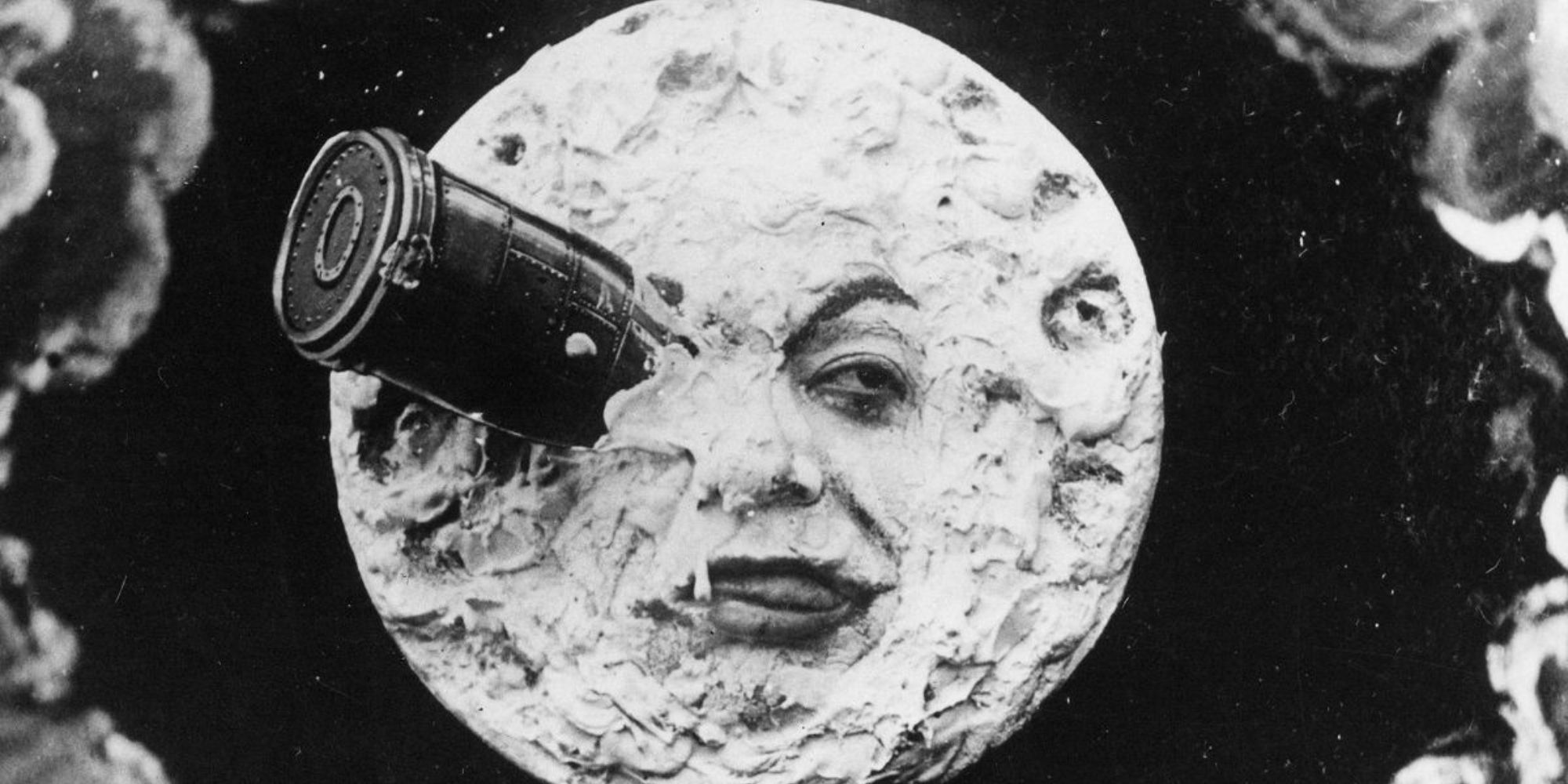 A rocket hits the moon on its eye in George Melies' A Trip to the Moon.