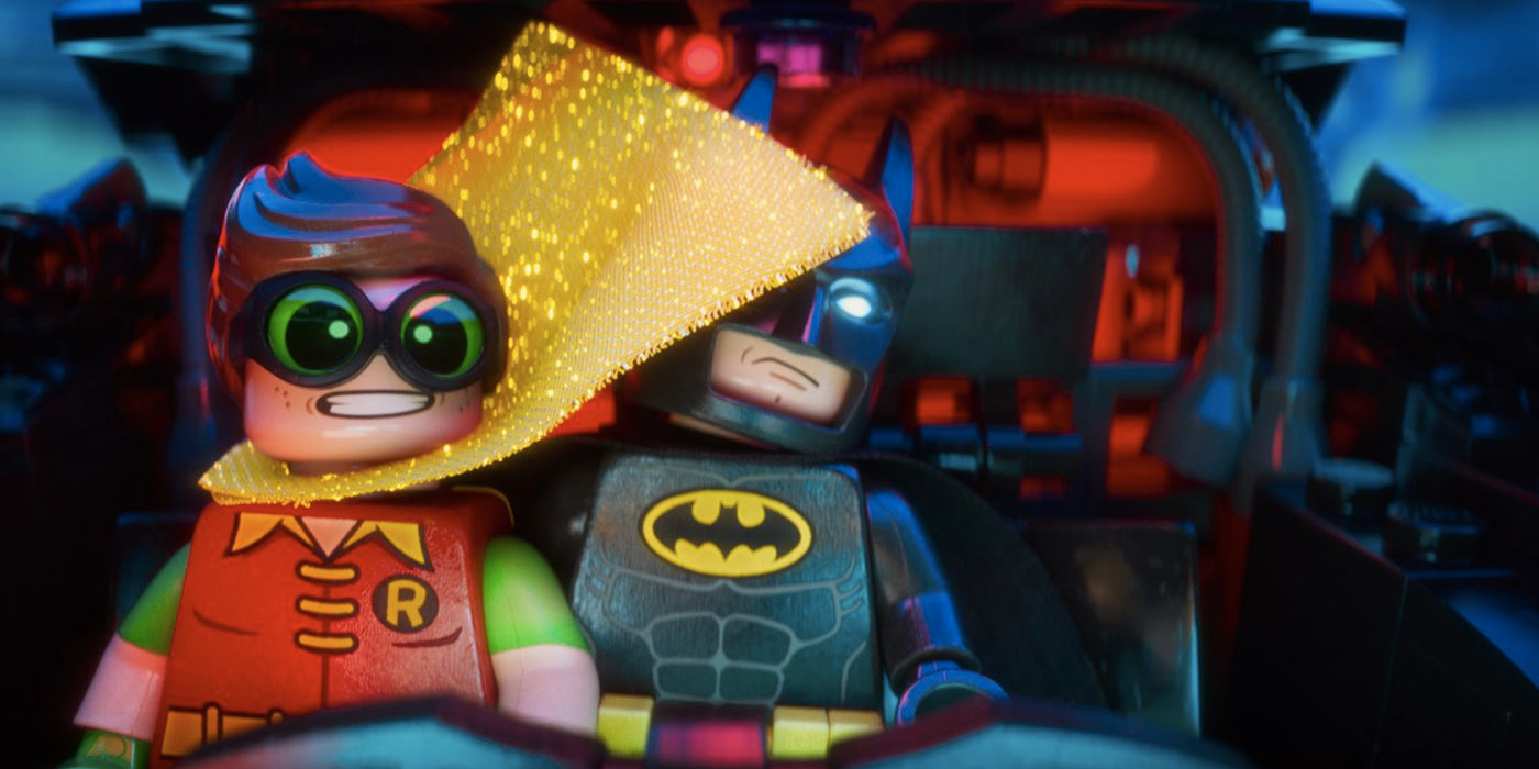 Lego Robin's cape getting in Batman's face in Lego Batman
