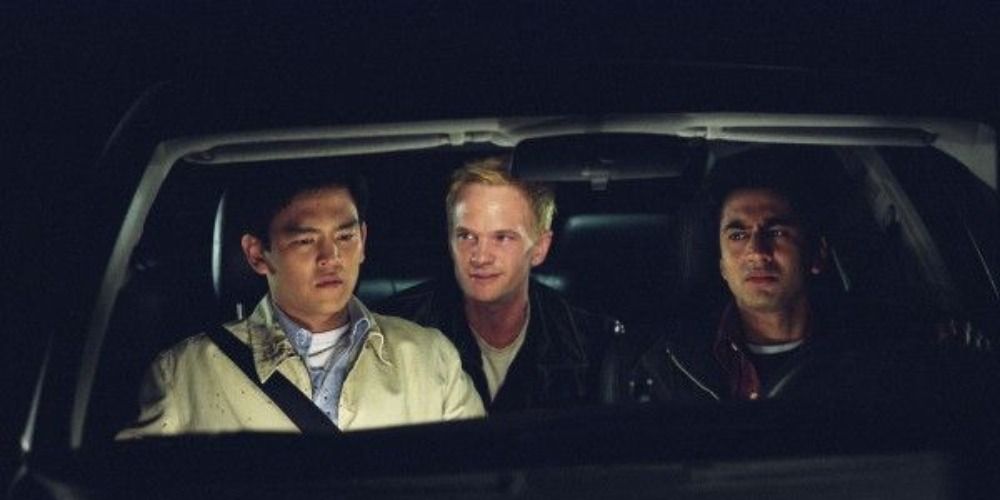 John Cho, Neil Patrick Harris, and Kal Penn sitting in a car in Harold & Kumar Go to White Castle