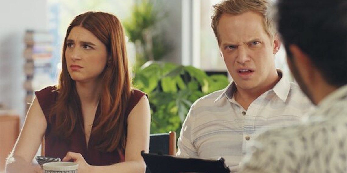 Aya Cash and Chris Geere look disgusted at a table in You're the Worst