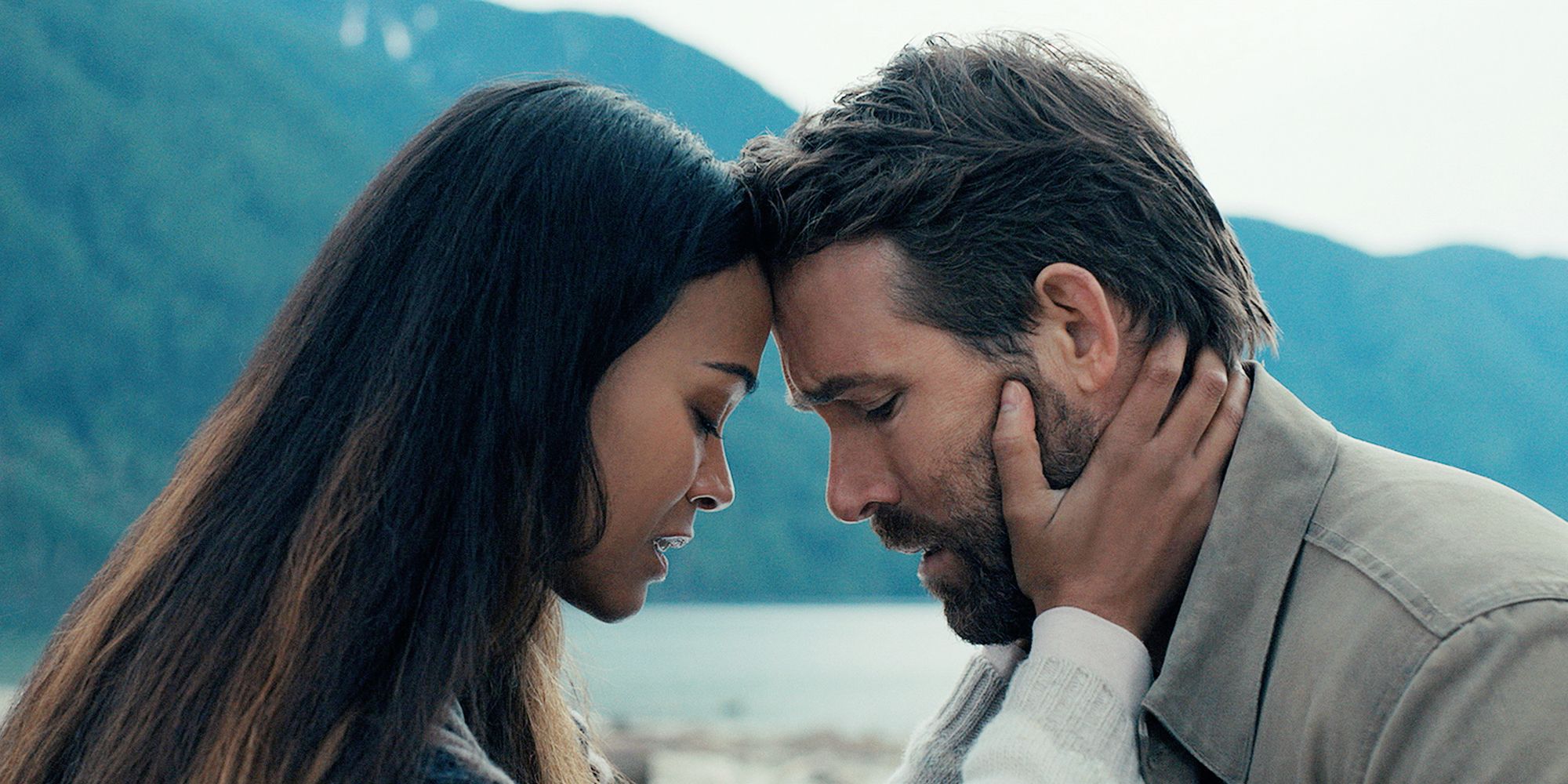 Adam Reed (Ryan Reynolds) and Laura Shane (Zoe Saldaña) press their foreheads together as they say goodbye in The Adam Project