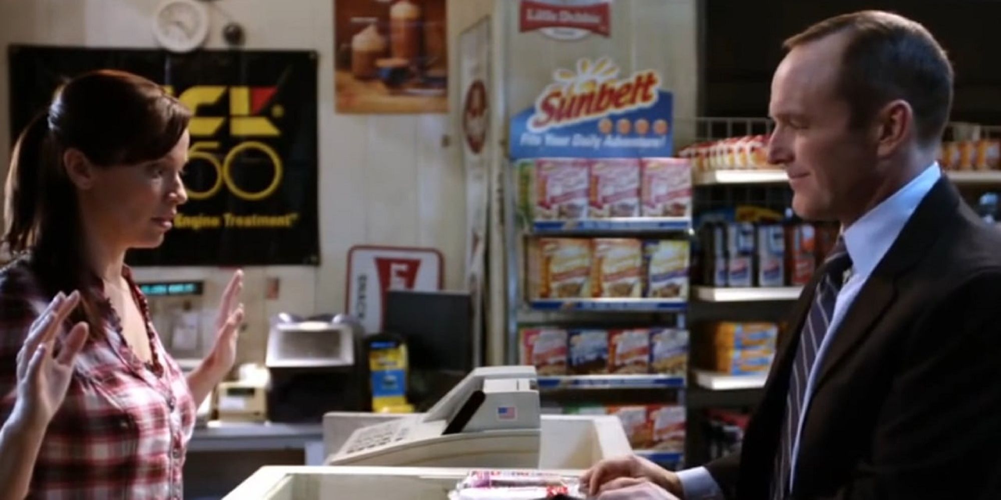 Phil Coulson buying food from a convenience store